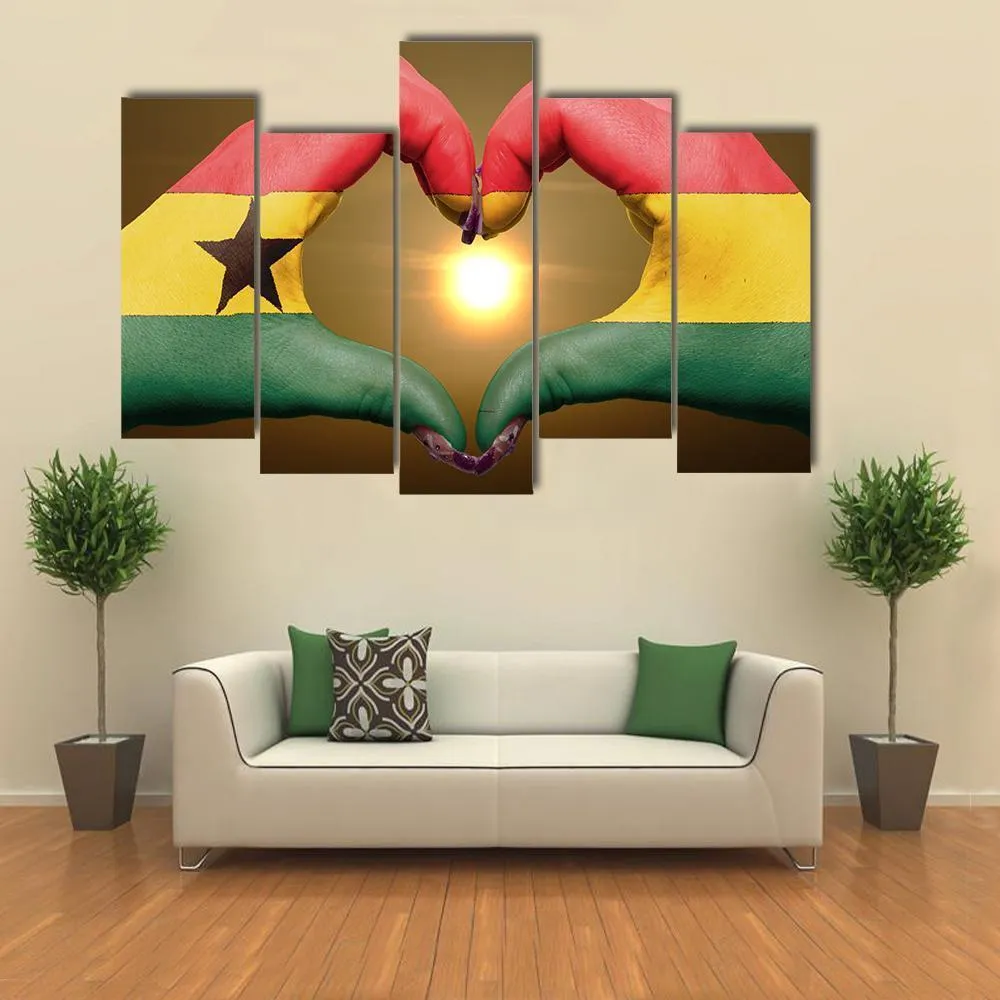 Ghana Flag On Hands Canvas Wall Art