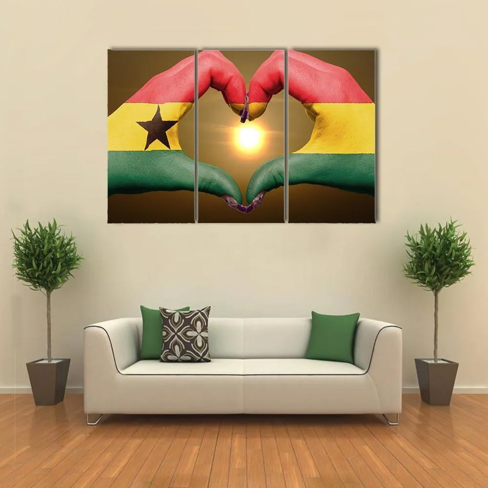 Ghana Flag On Hands Canvas Wall Art